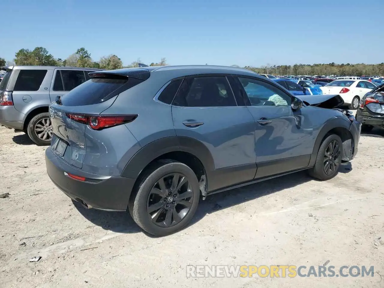 3 fotografías del automóvil dañado 3MVDMBDY1NM437977 MAZDA CX30 2022