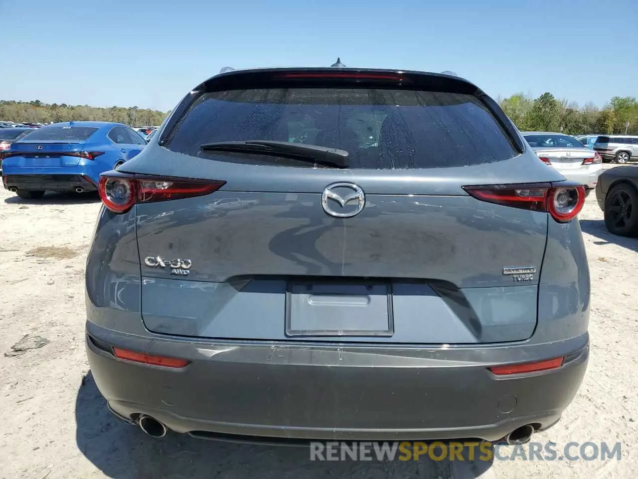 6 fotografías del automóvil dañado 3MVDMBDY1NM437977 MAZDA CX30 2022