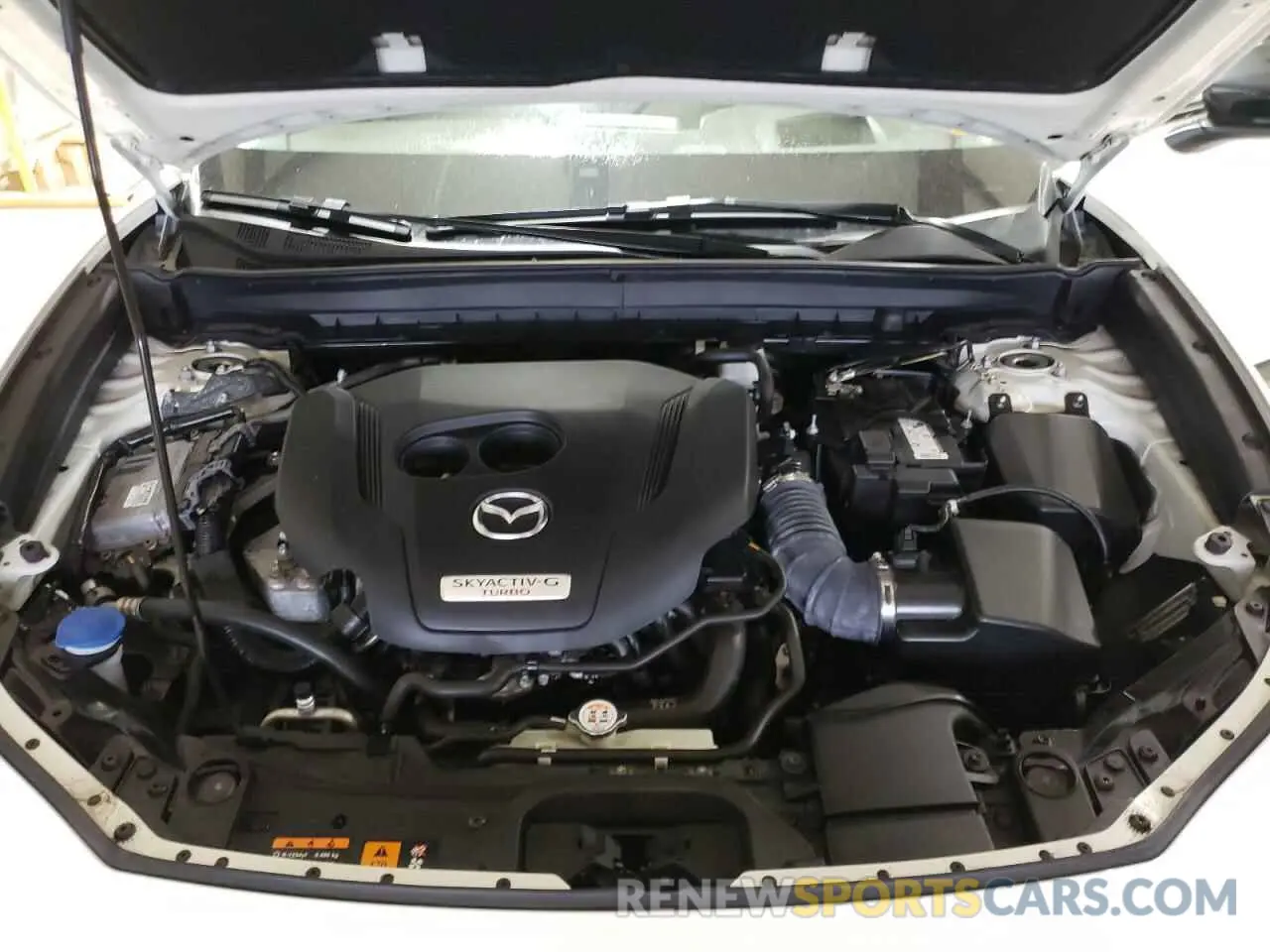 12 fotografías del automóvil dañado 3MVDMBEY5NM448012 MAZDA CX30 2022