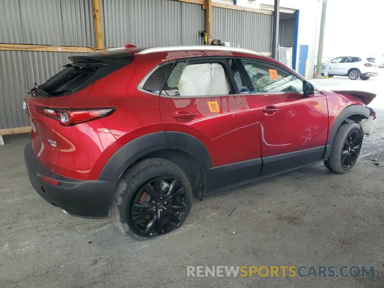 3 fotografías del automóvil dañado 3MVDMBEY7NM423936 MAZDA CX30 2022