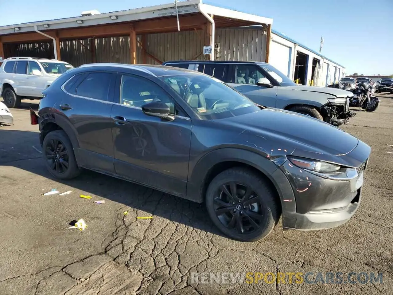 4 fotografías del automóvil dañado 3MVDMBEYXNM412364 MAZDA CX30 2022