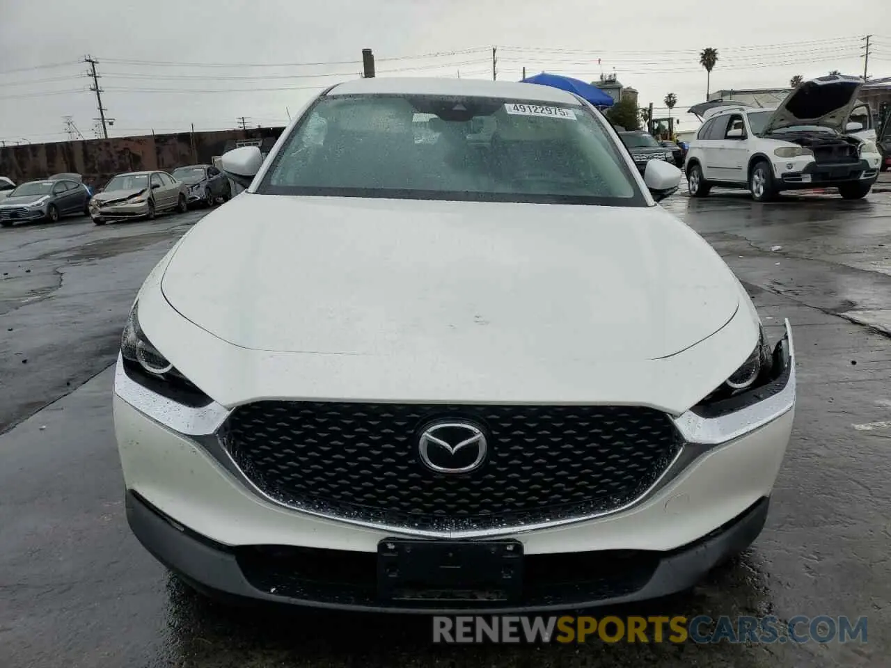 5 fotografías del automóvil dañado 3MVDMBAM4PM522056 MAZDA CX30 2023