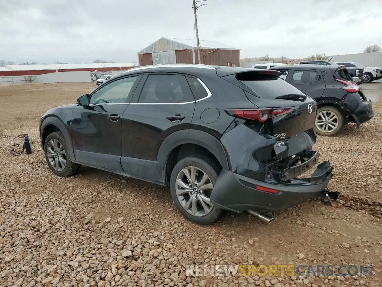 2 fotografías del automóvil dañado 3MVDMBBM0PM562276 MAZDA CX30 2023