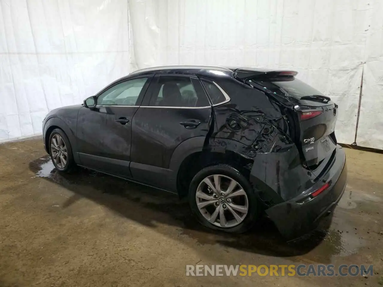 2 fotografías del automóvil dañado 3MVDMBBM0PM574671 MAZDA CX30 2023