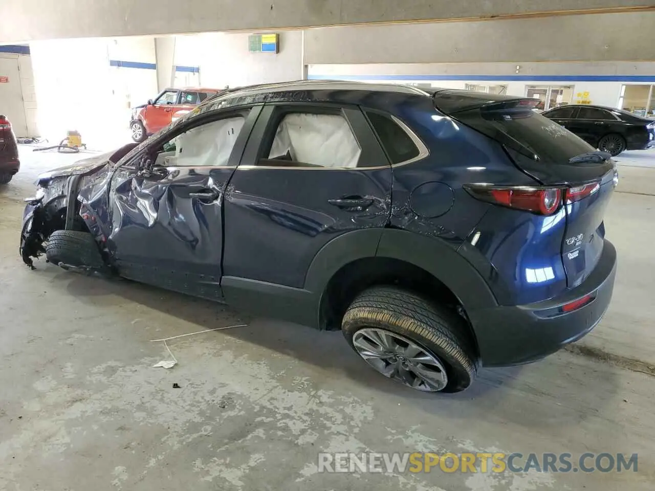 2 fotografías del automóvil dañado 3MVDMBBM1PM563758 MAZDA CX30 2023
