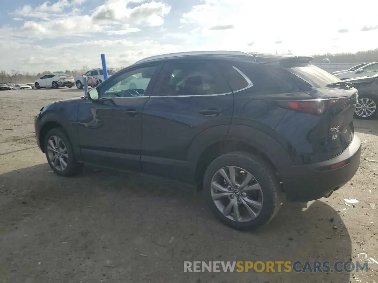 2 fotografías del automóvil dañado 3MVDMBBM1PM571746 MAZDA CX30 2023