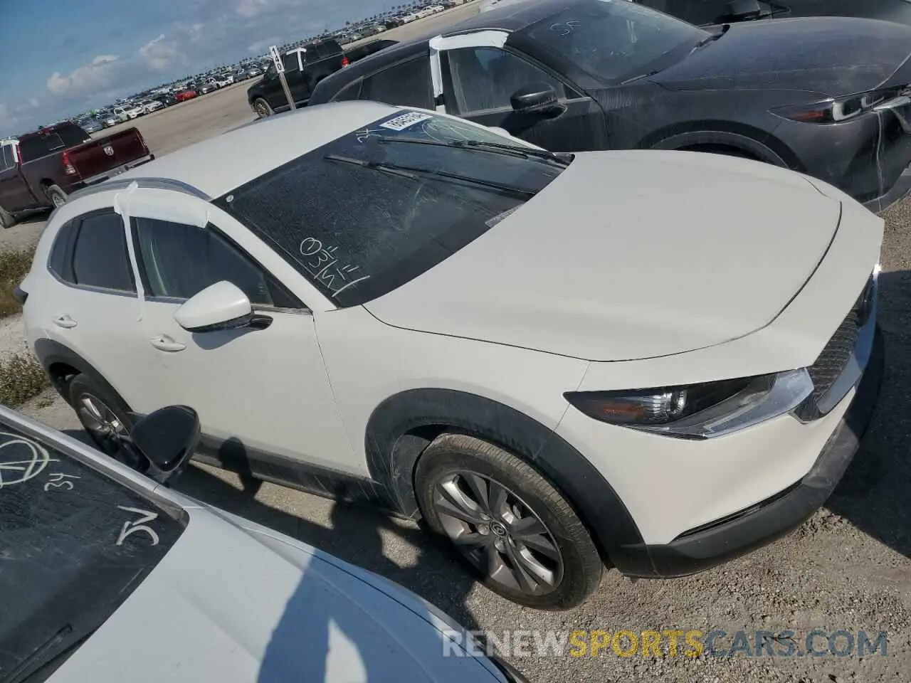 4 fotografías del automóvil dañado 3MVDMBBM4PM545982 MAZDA CX30 2023