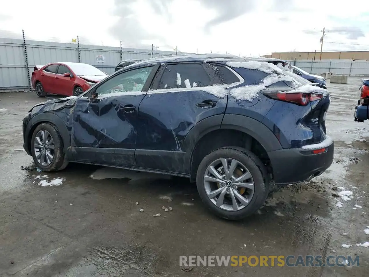 2 fotografías del automóvil dañado 3MVDMBBM5PM541679 MAZDA CX30 2023