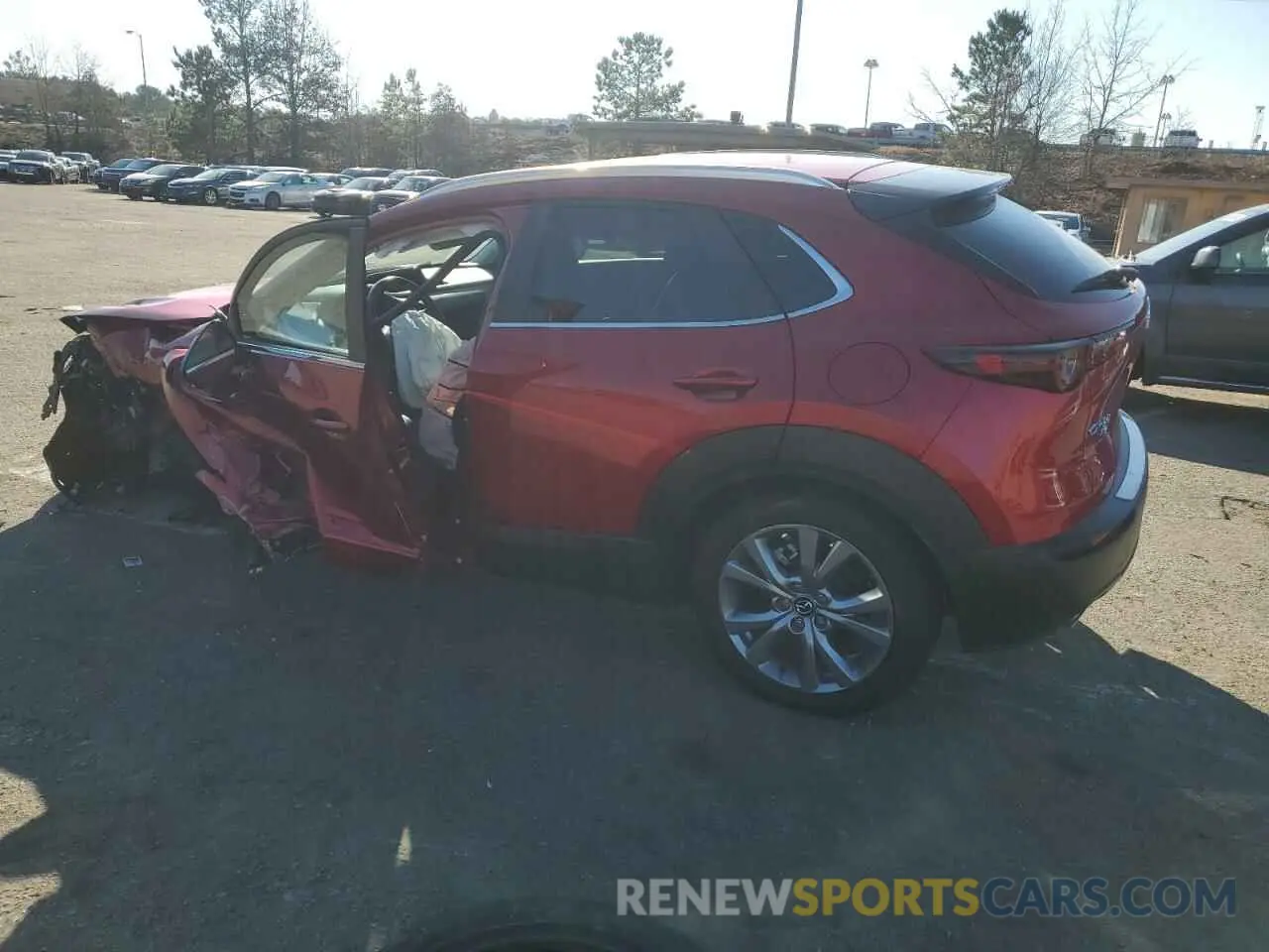 2 fotografías del automóvil dañado 3MVDMBBM5PM576691 MAZDA CX30 2023