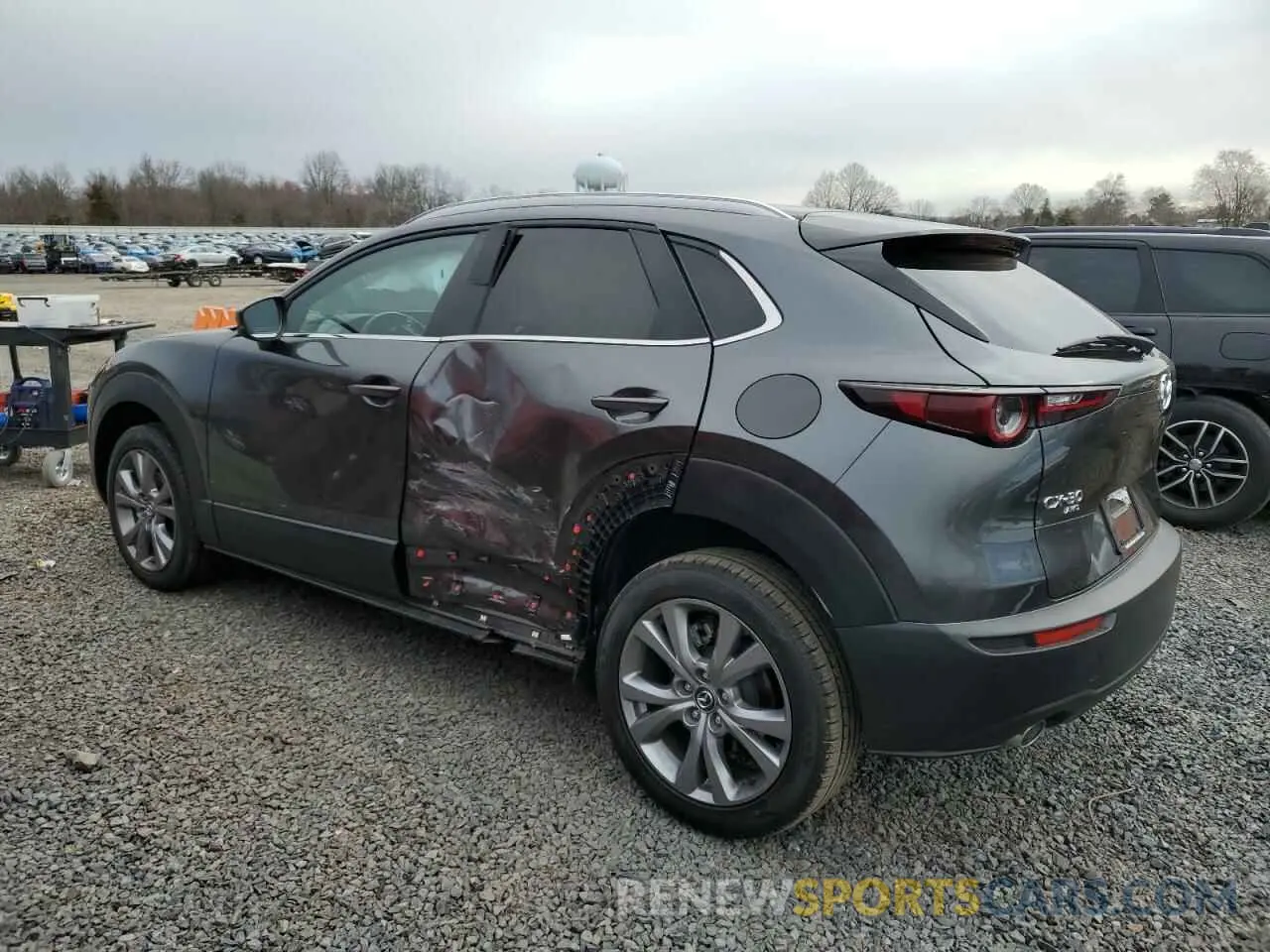 2 fotografías del automóvil dañado 3MVDMBBM7PM532885 MAZDA CX30 2023