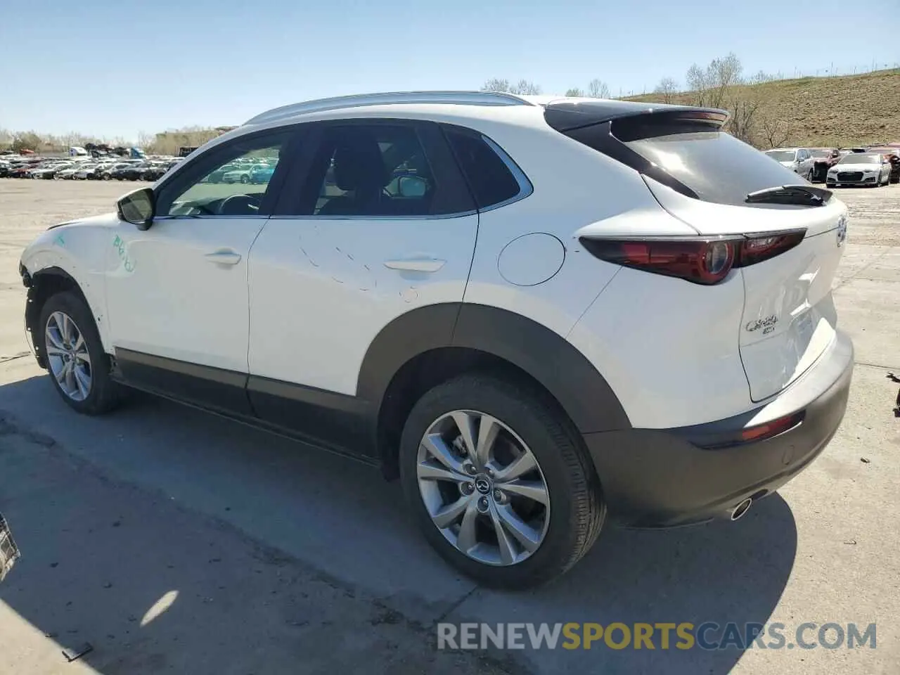 2 fotografías del automóvil dañado 3MVDMBBM8PM568732 MAZDA CX30 2023
