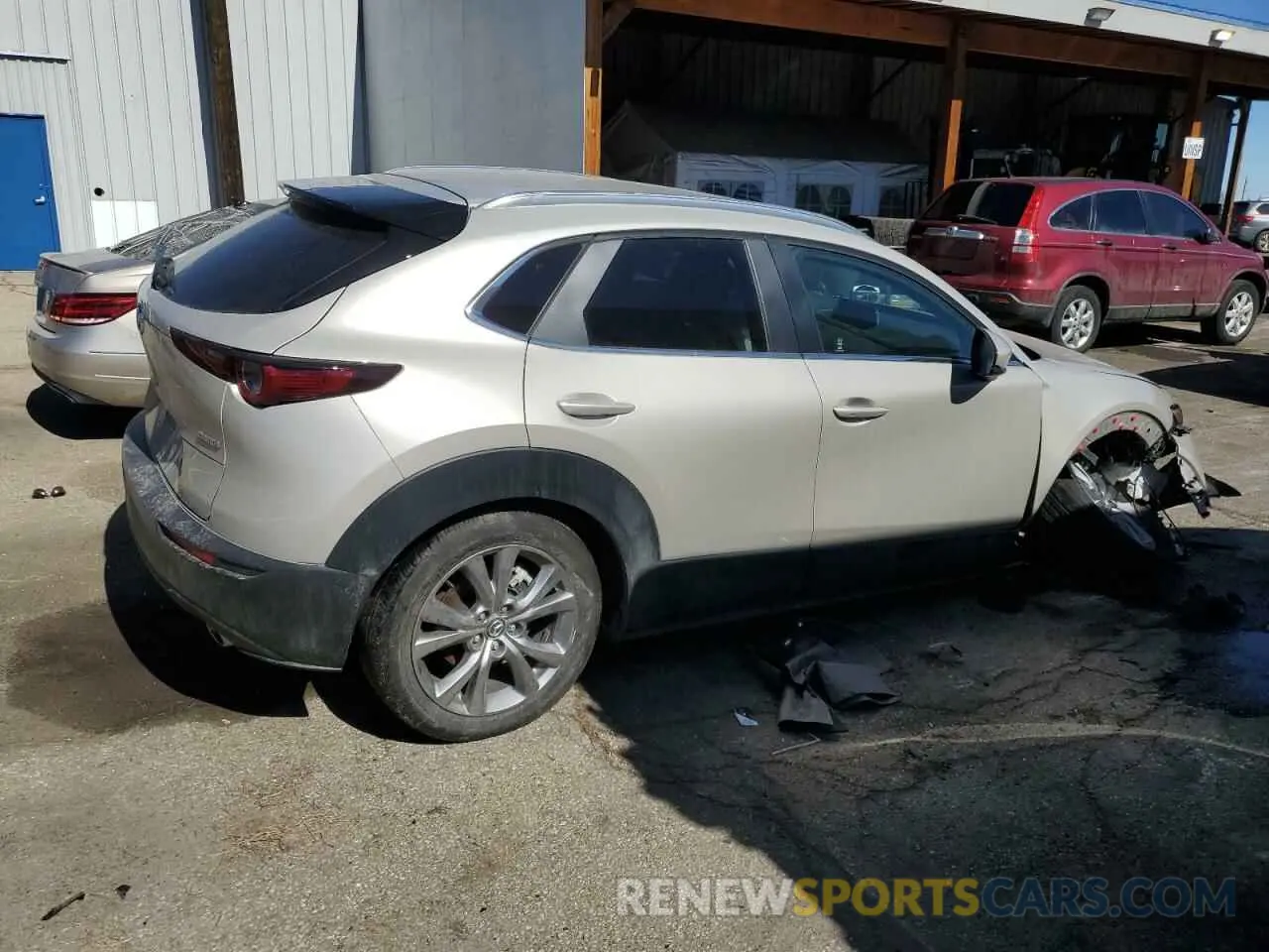 3 fotografías del automóvil dañado 3MVDMBBM8PM571503 MAZDA CX30 2023
