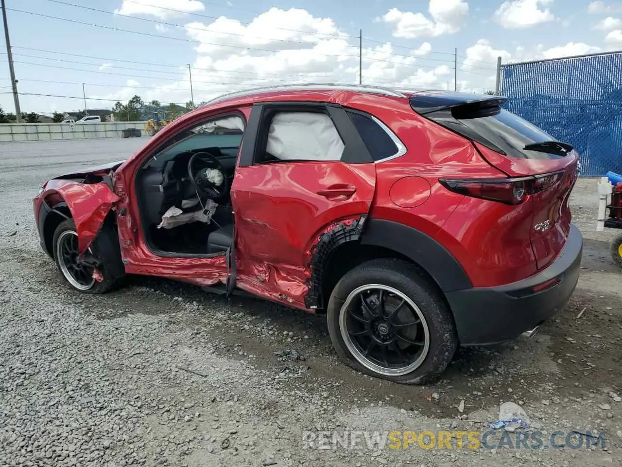 2 fotografías del automóvil dañado 3MVDMBCM0PM533469 MAZDA CX30 2023