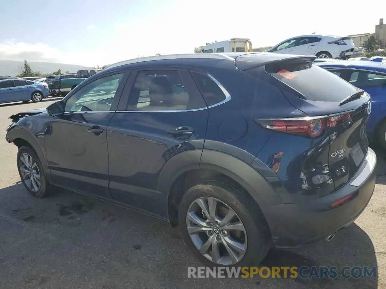 2 fotografías del automóvil dañado 3MVDMBCM1PM582423 MAZDA CX30 2023
