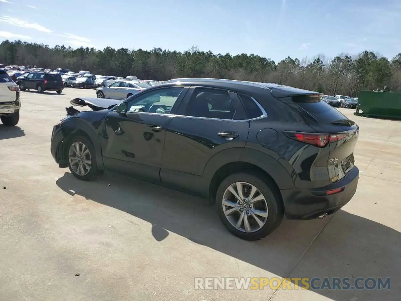 2 fotografías del automóvil dañado 3MVDMBCM4PM527285 MAZDA CX30 2023