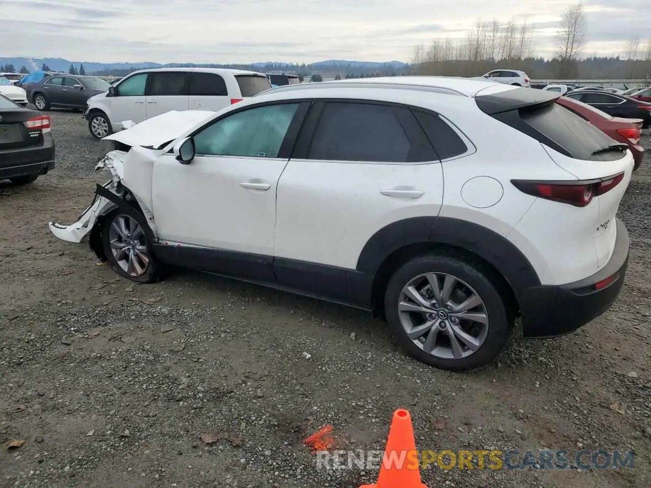2 fotografías del automóvil dañado 3MVDMBCM8PM522199 MAZDA CX30 2023