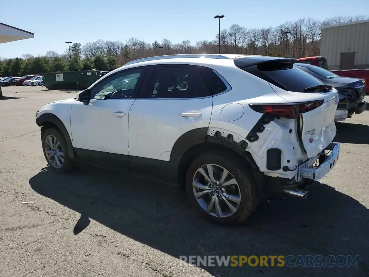 2 fotografías del automóvil dañado 3MVDMBCMXPM547654 MAZDA CX30 2023