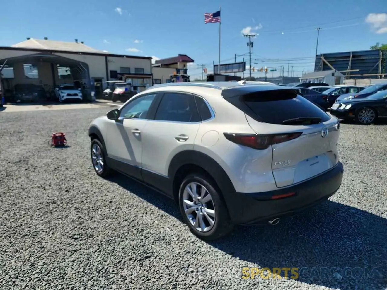 2 fotografías del automóvil dañado 3MVDMBDM1PM568102 MAZDA CX30 2023