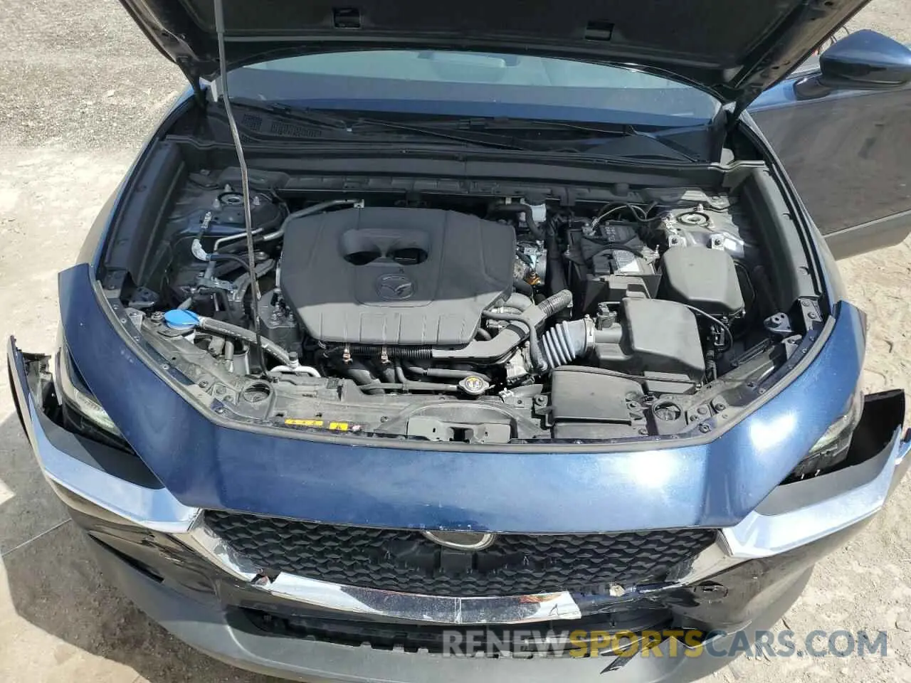 12 fotografías del automóvil dañado 3MVDMBAM4RM642331 MAZDA CX30 2024