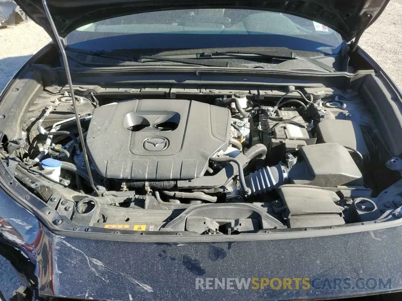 12 fotografías del automóvil dañado 3MVDMBAM5RM688864 MAZDA CX30 2024