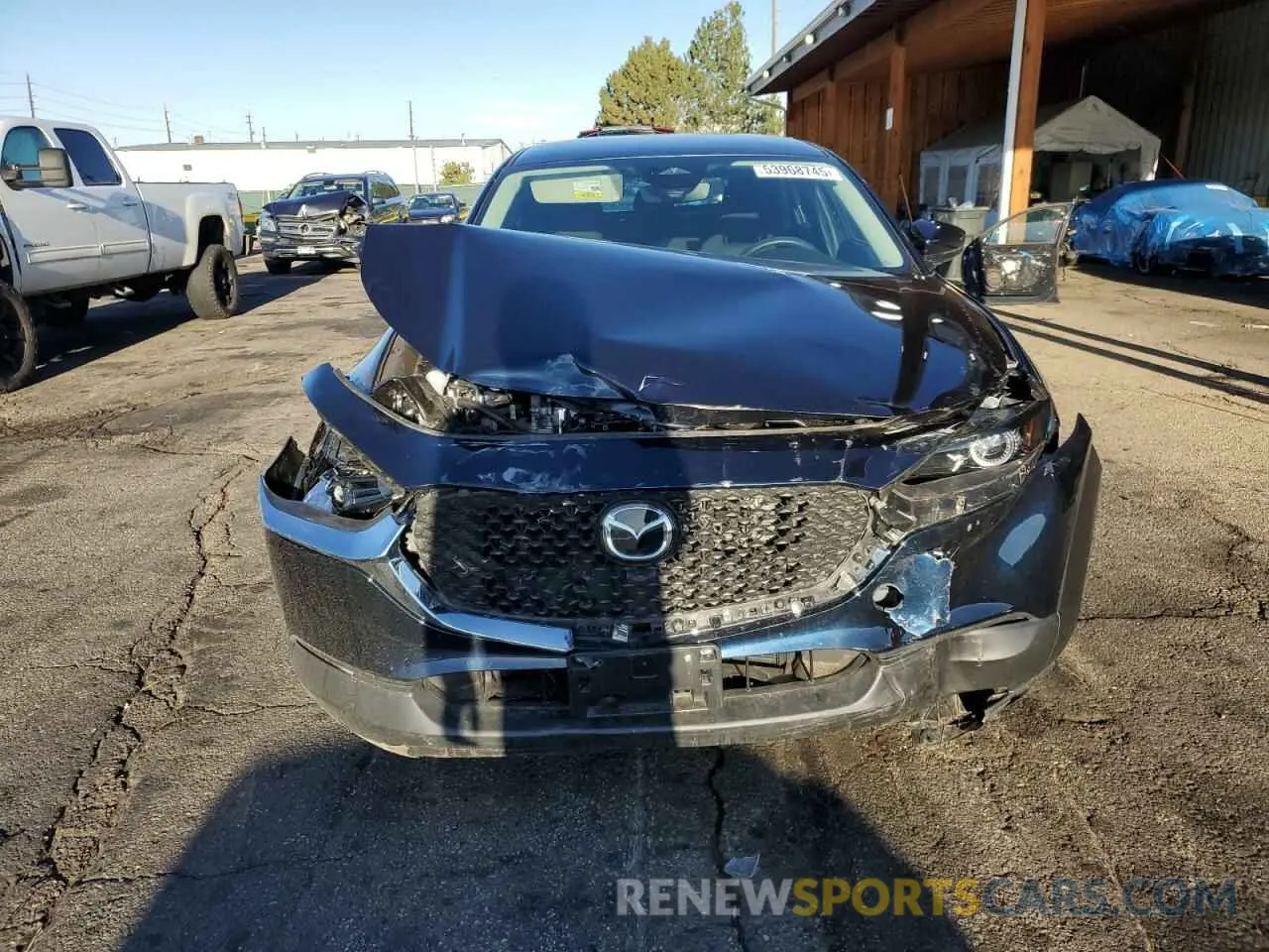 5 fotografías del automóvil dañado 3MVDMBAM5RM720275 MAZDA CX30 2024