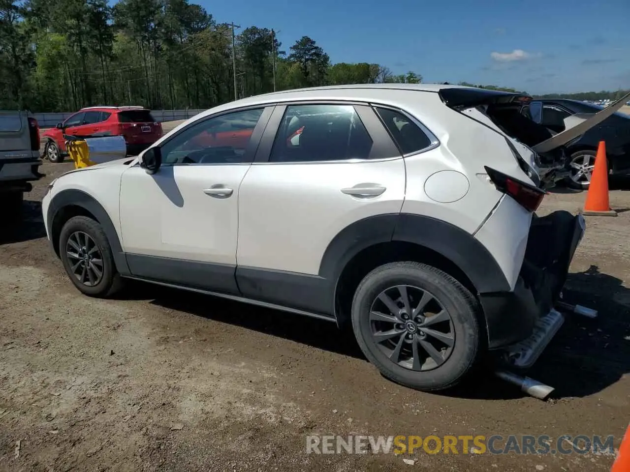 2 fotografías del automóvil dañado 3MVDMBAMXRM659652 MAZDA CX30 2024