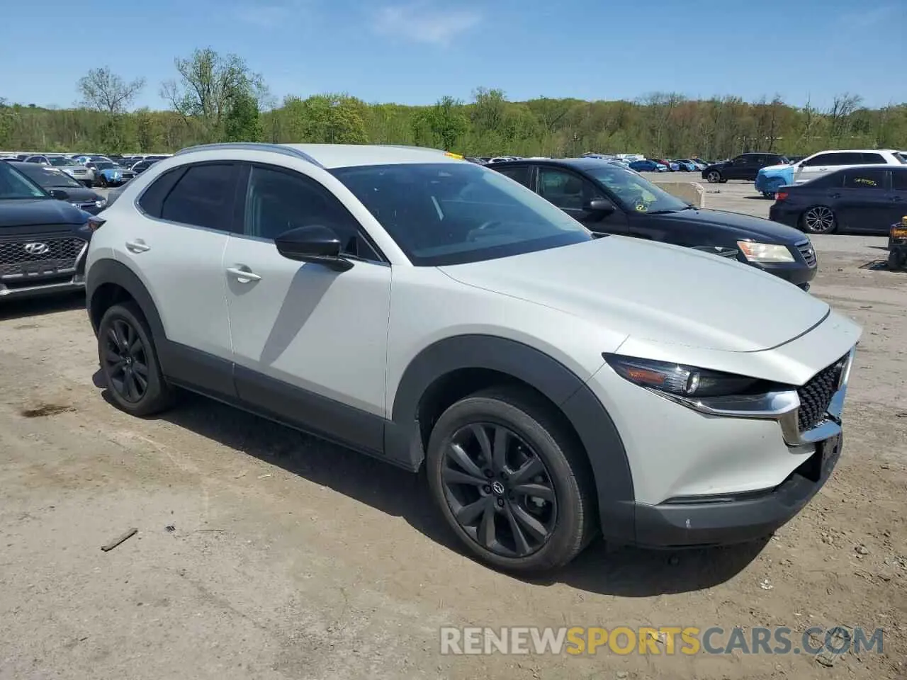 4 fotografías del automóvil dañado 3MVDMBBM1RM647338 MAZDA CX30 2024