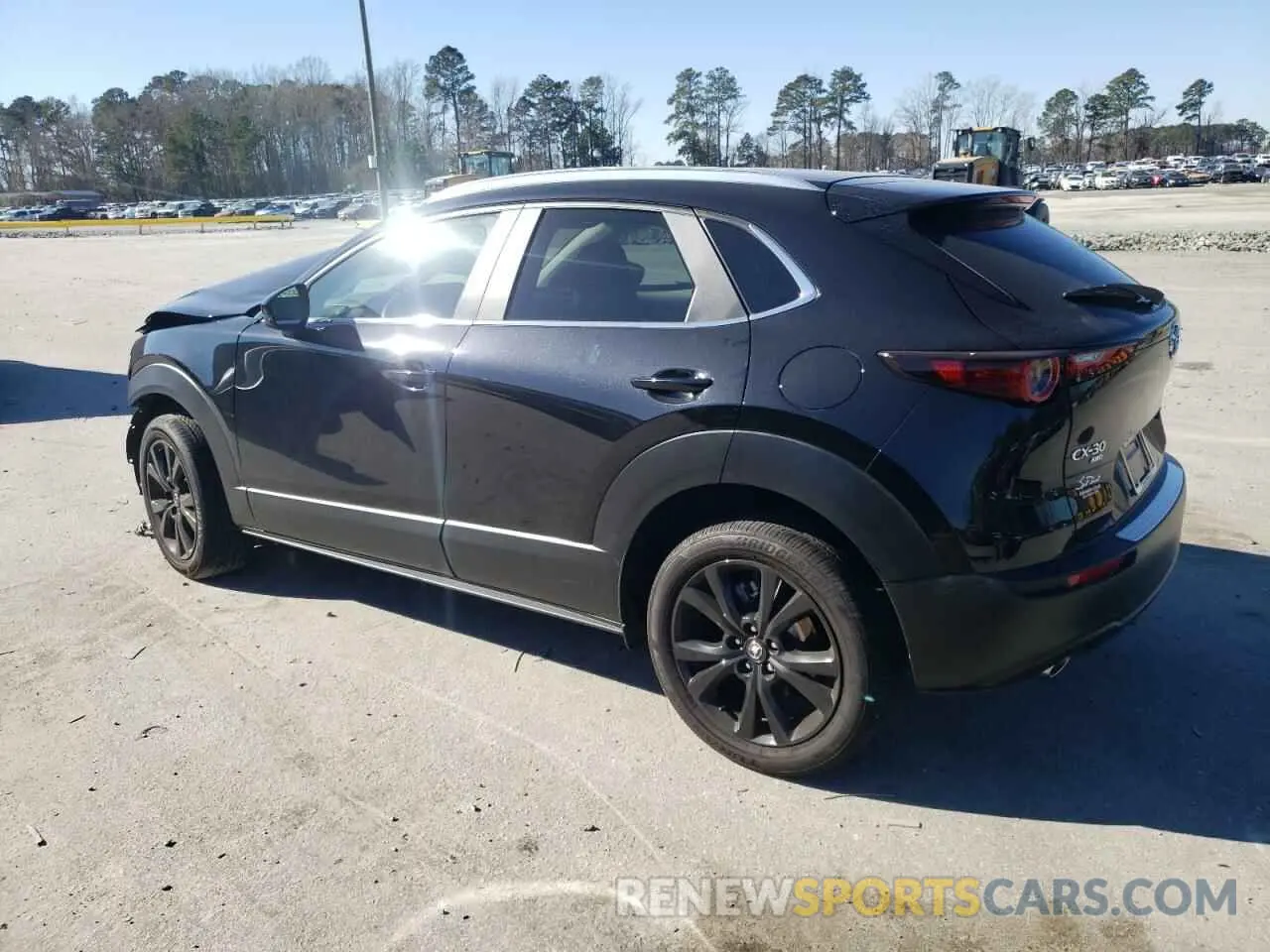 2 fotografías del automóvil dañado 3MVDMBBM1RM672661 MAZDA CX30 2024