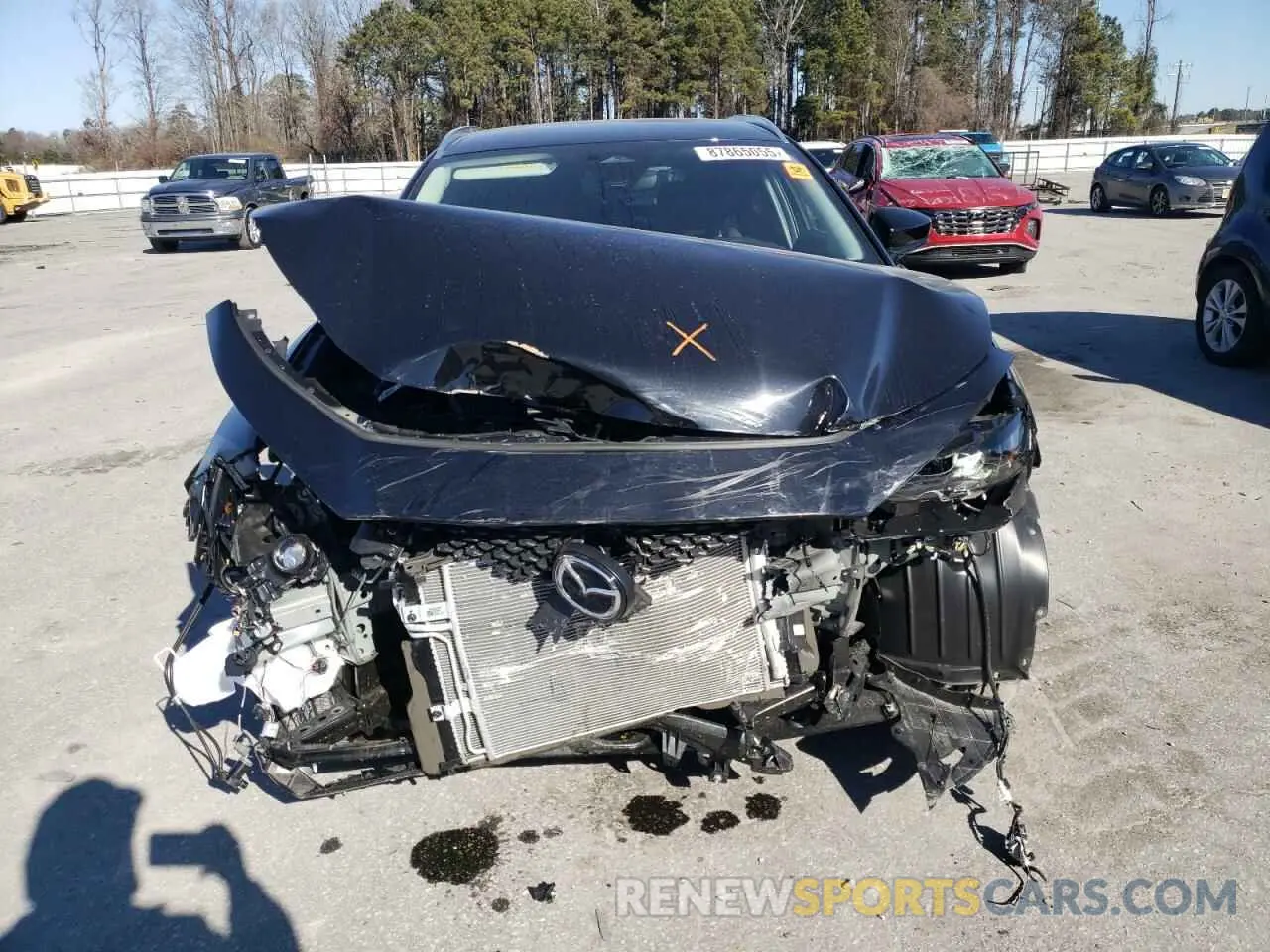5 fotografías del automóvil dañado 3MVDMBBM1RM672661 MAZDA CX30 2024