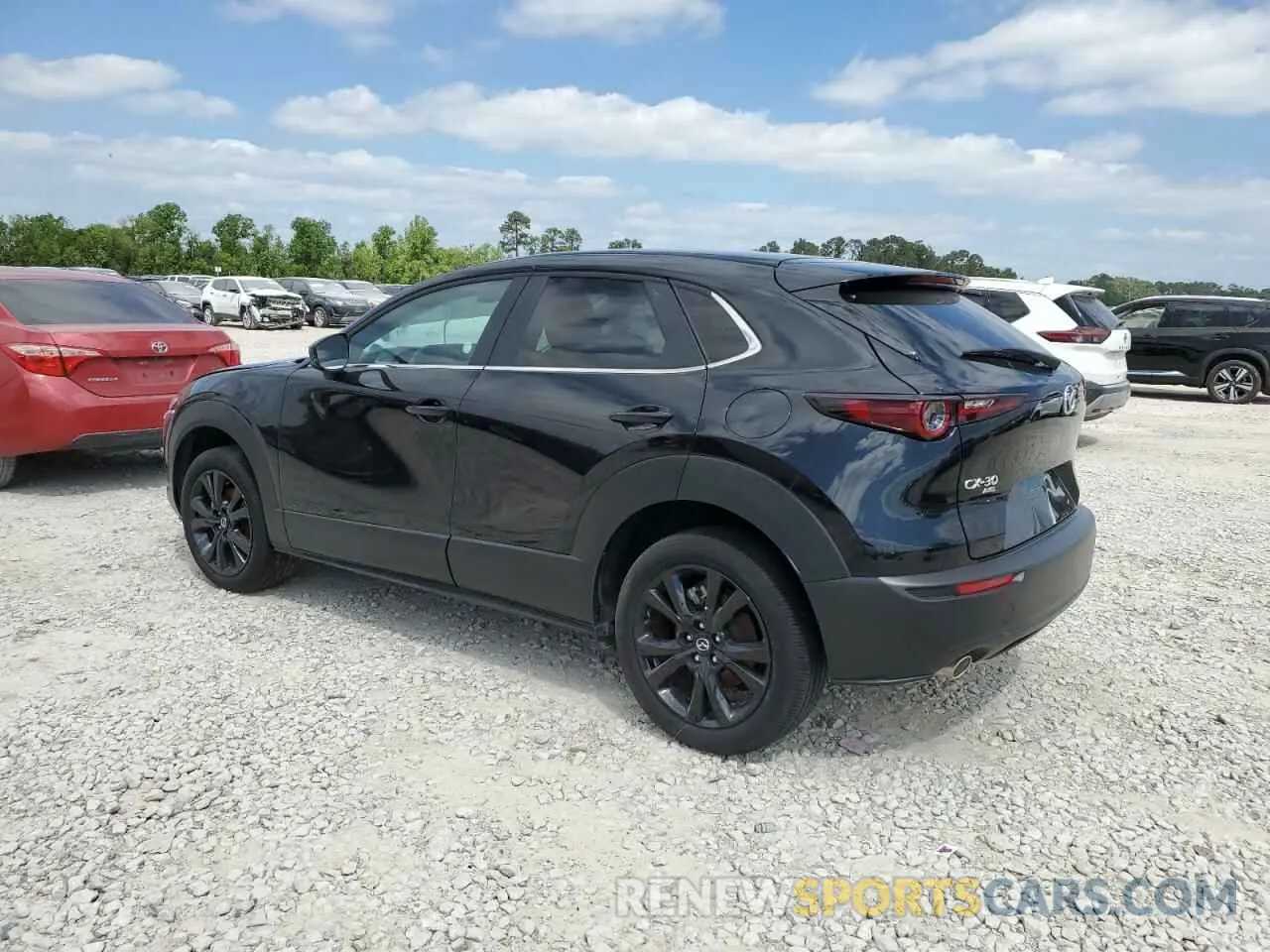 2 fotografías del automóvil dañado 3MVDMBBM5RM626122 MAZDA CX30 2024