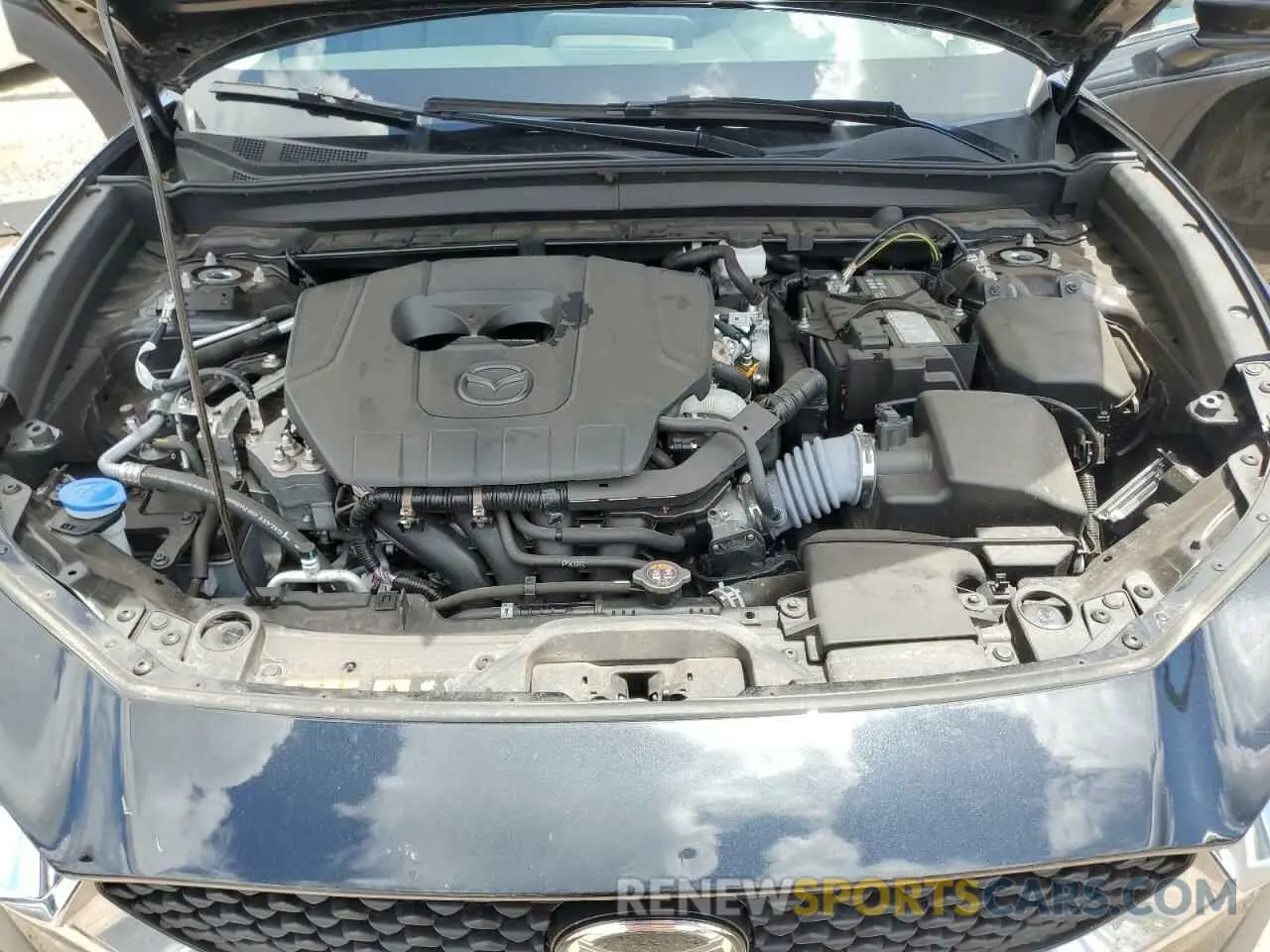 12 fotografías del automóvil dañado 3MVDMBBM5RM655247 MAZDA CX30 2024
