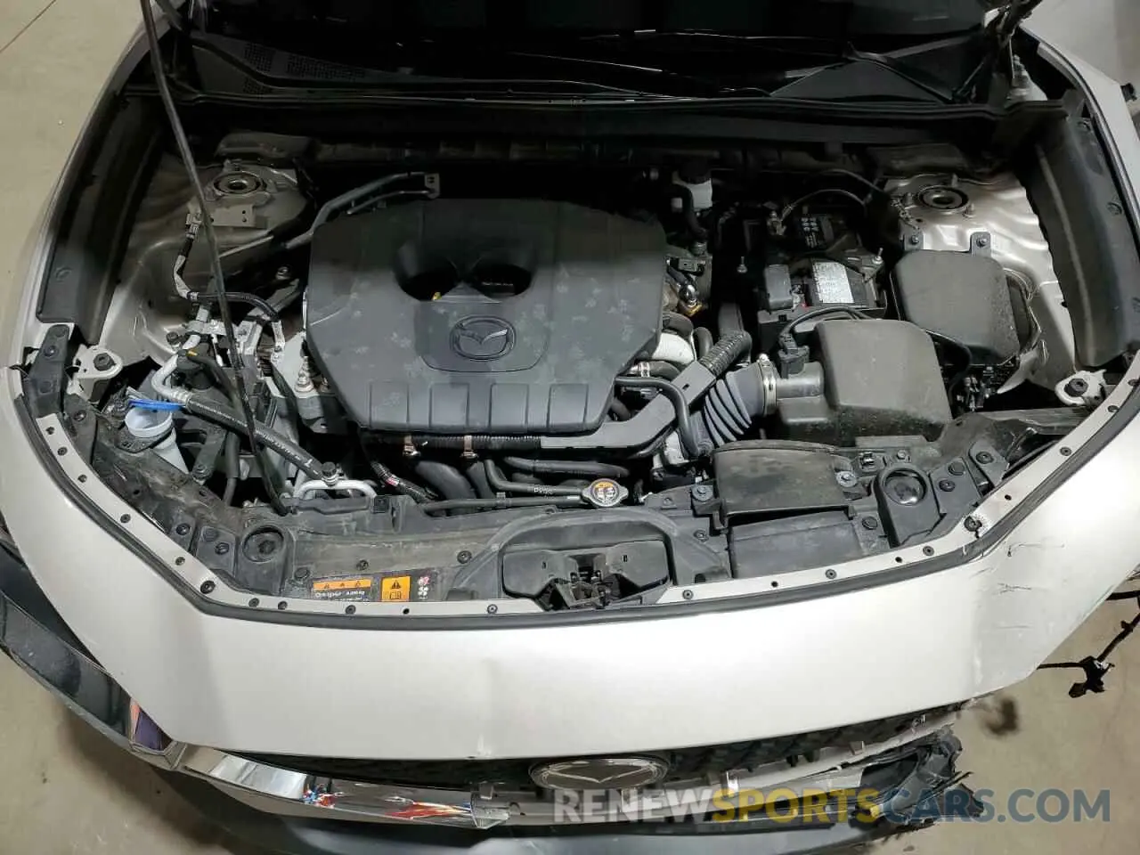 12 fotografías del automóvil dañado 3MVDMBBM6RM658481 MAZDA CX30 2024