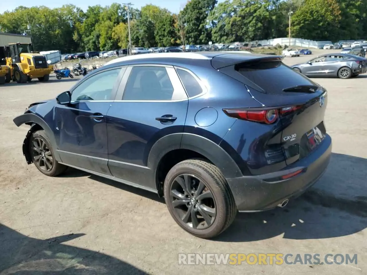 2 fotografías del automóvil dañado 3MVDMBBM7RM664516 MAZDA CX30 2024