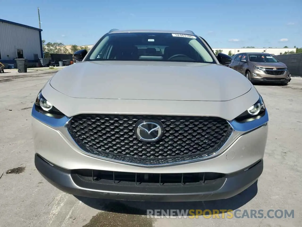 5 fotografías del automóvil dañado 3MVDMBBMXRM713496 MAZDA CX30 2024