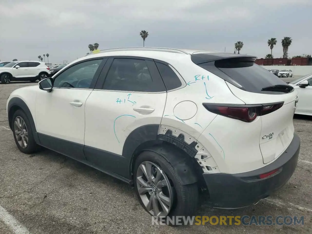 2 fotografías del automóvil dañado 3MVDMBCM2RM664132 MAZDA CX30 2024