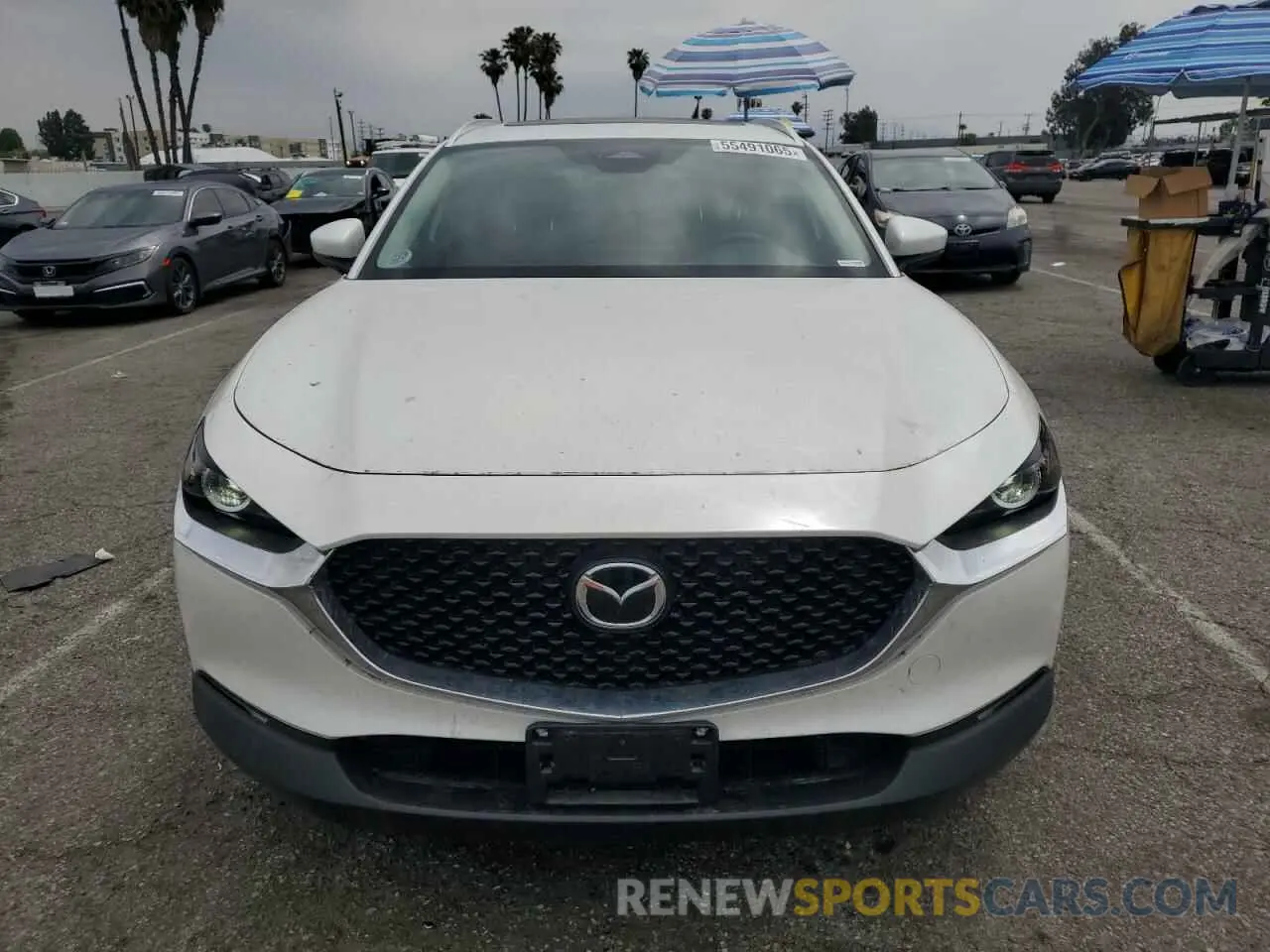 5 fotografías del automóvil dañado 3MVDMBCM2RM664132 MAZDA CX30 2024