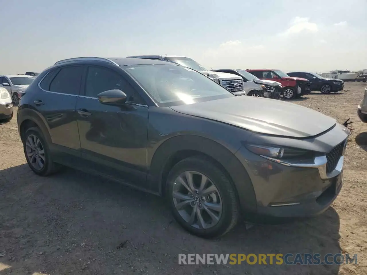 4 fotografías del automóvil dañado 3MVDMBCM3RM714035 MAZDA CX30 2024