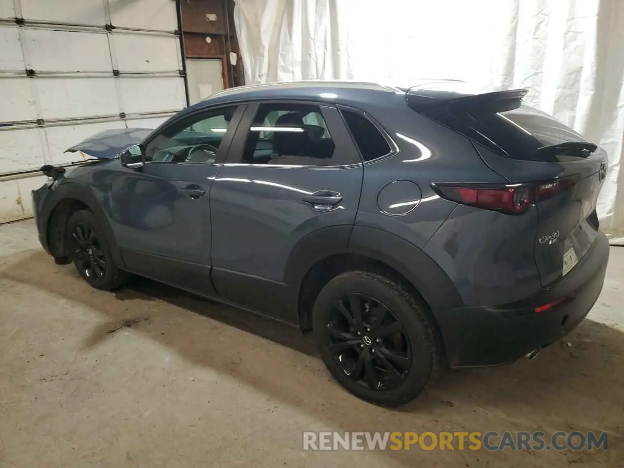 2 fotografías del automóvil dañado 3MVDMBCM5RM632985 MAZDA CX30 2024