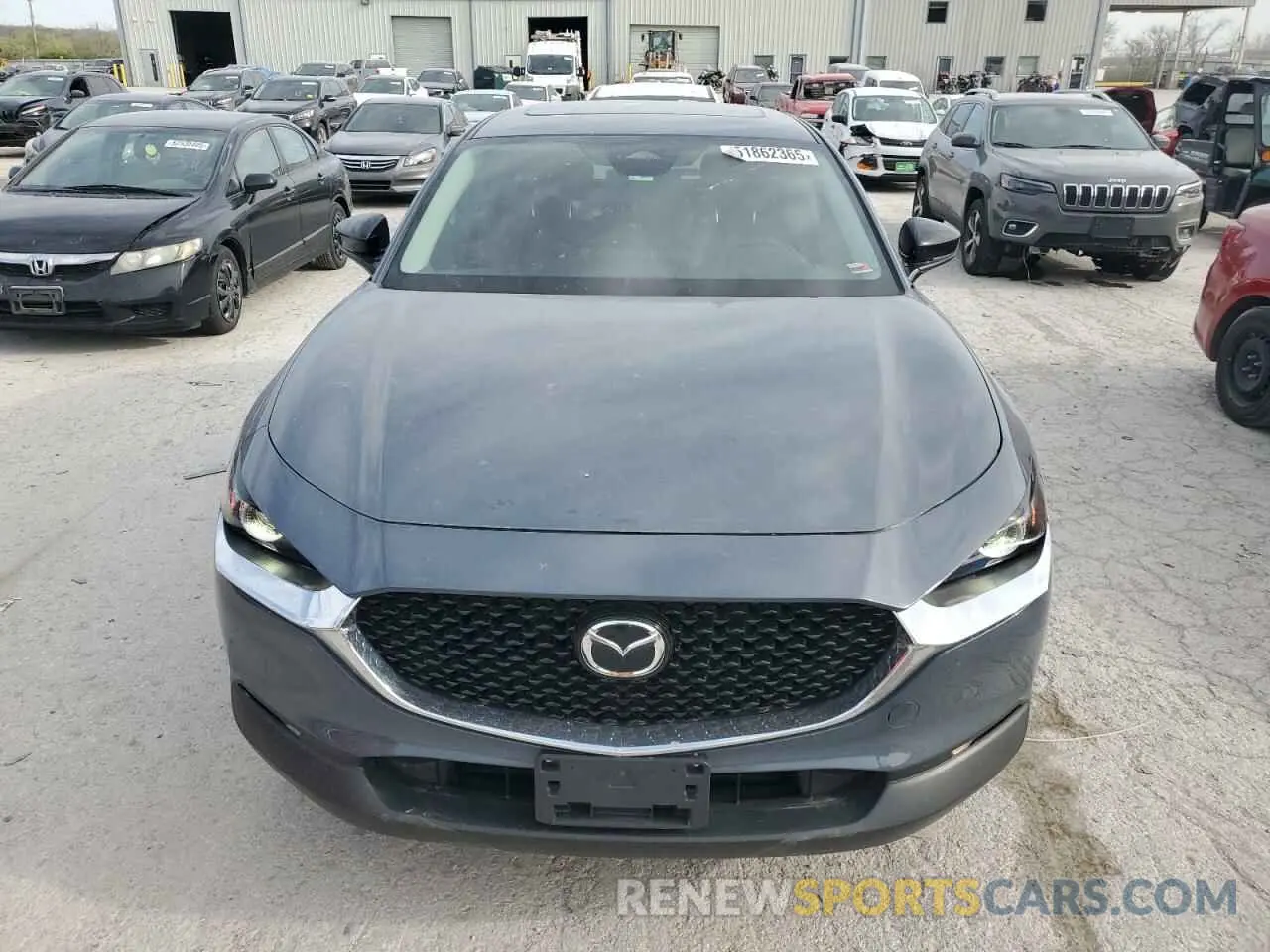 5 fotografías del automóvil dañado 3MVDMBCM6RM624524 MAZDA CX30 2024