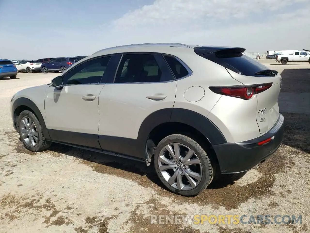 2 fotografías del automóvil dañado 3MVDMBCM7RM711199 MAZDA CX30 2024