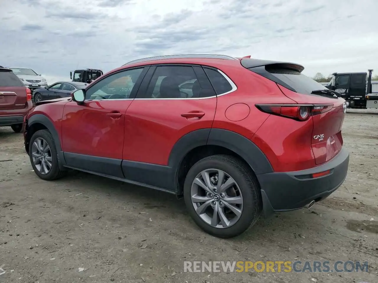 2 fotografías del automóvil dañado 3MVDMBDM0RM693109 MAZDA CX30 2024