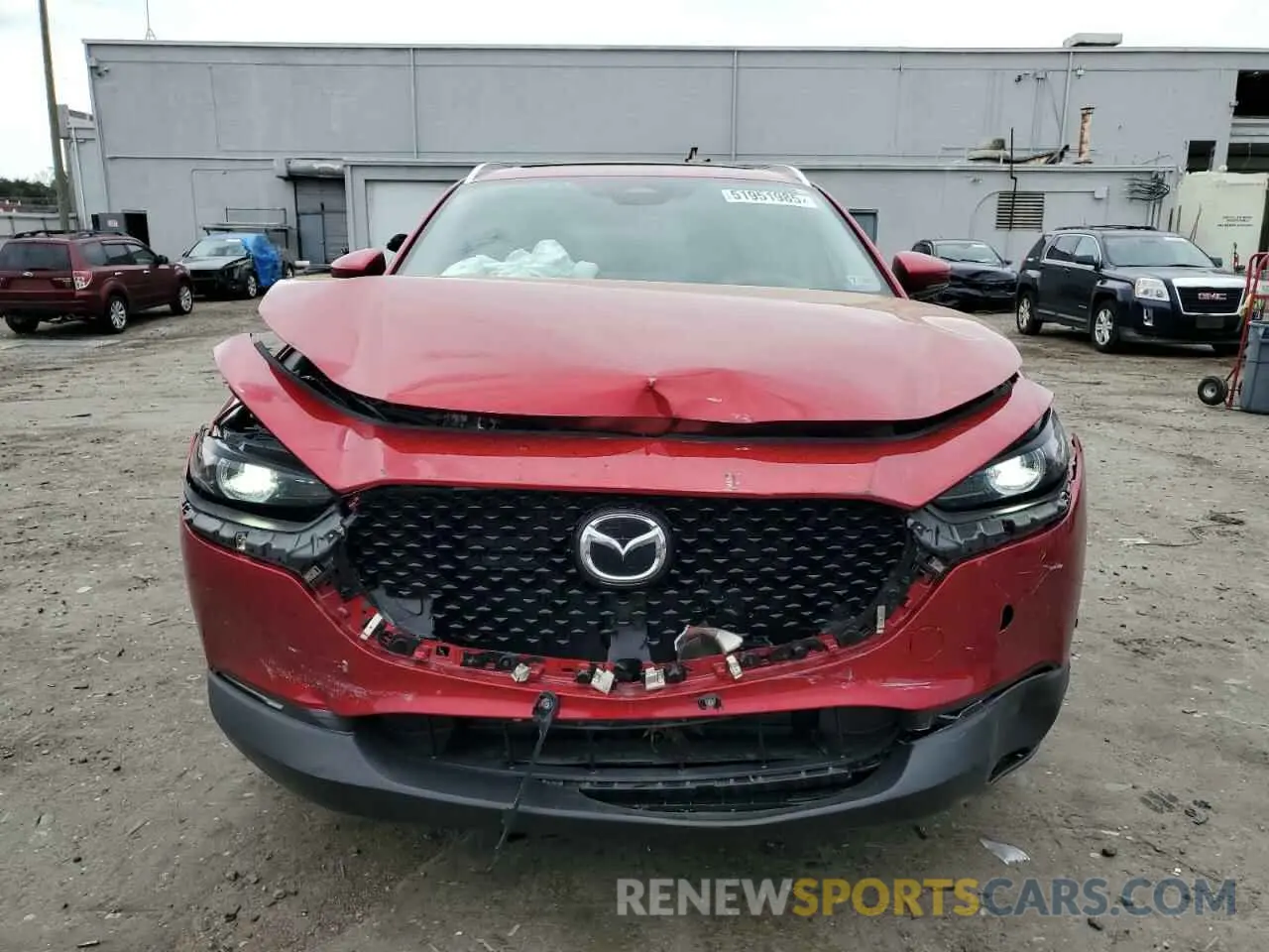5 fotografías del automóvil dañado 3MVDMBDM0RM693109 MAZDA CX30 2024