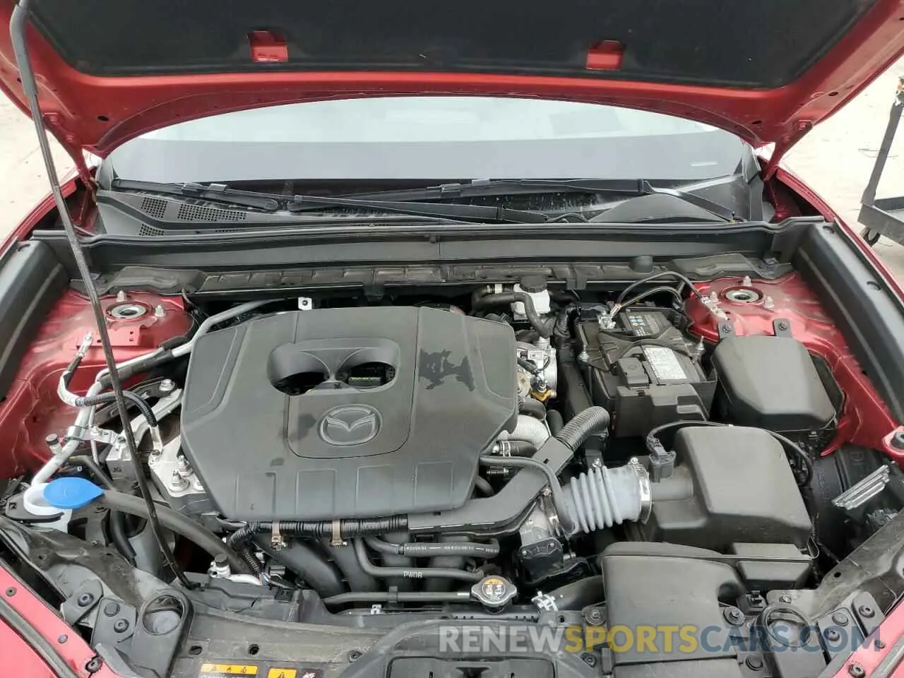 14 fotografías del automóvil dañado 3MVDMBDM8RM668801 MAZDA CX30 2024