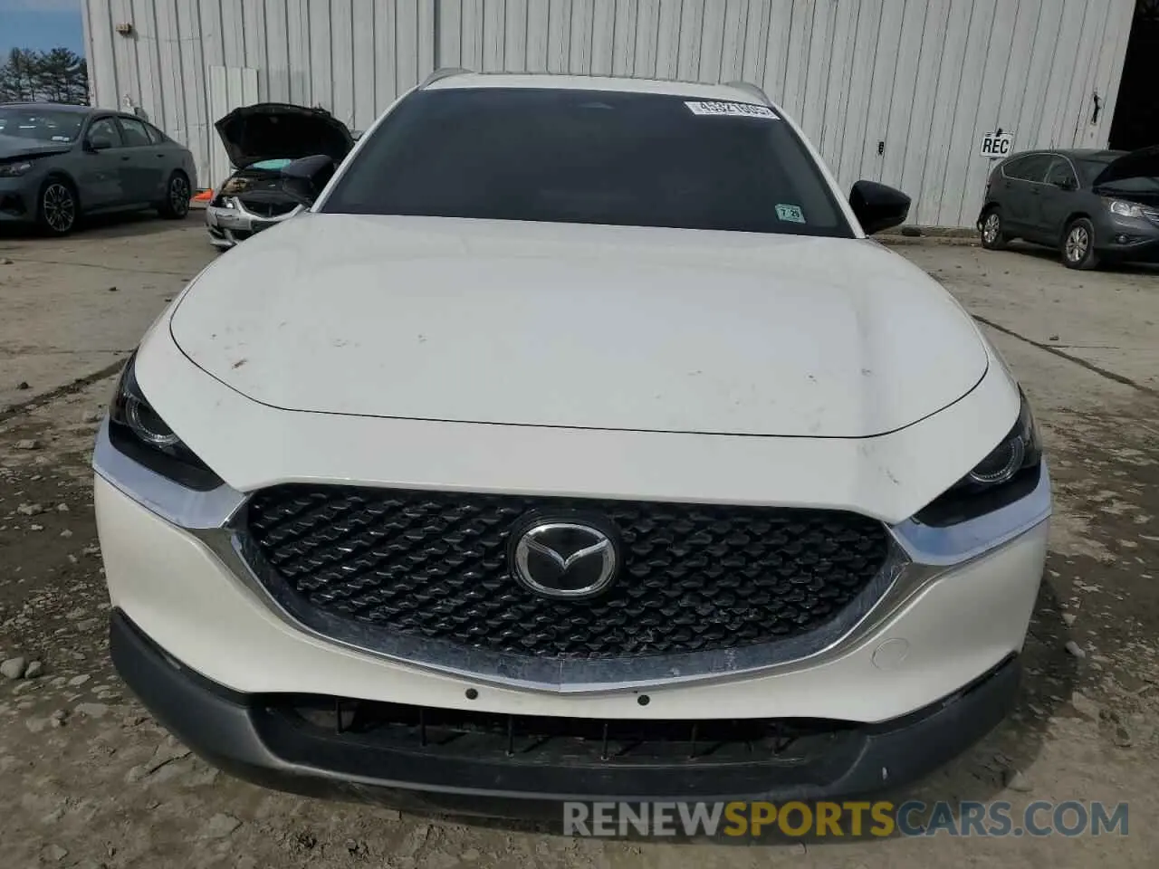 5 fotografías del automóvil dañado 3MVDMBDY3RM683631 MAZDA CX30 2024