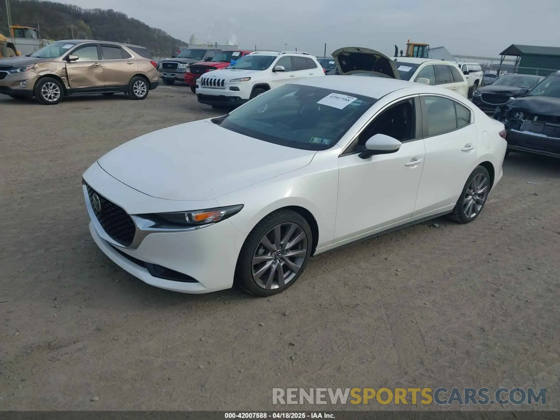 2 fotografías del automóvil dañado 3MZBPADL4KM106317 MAZDA MAZDA3 2019
