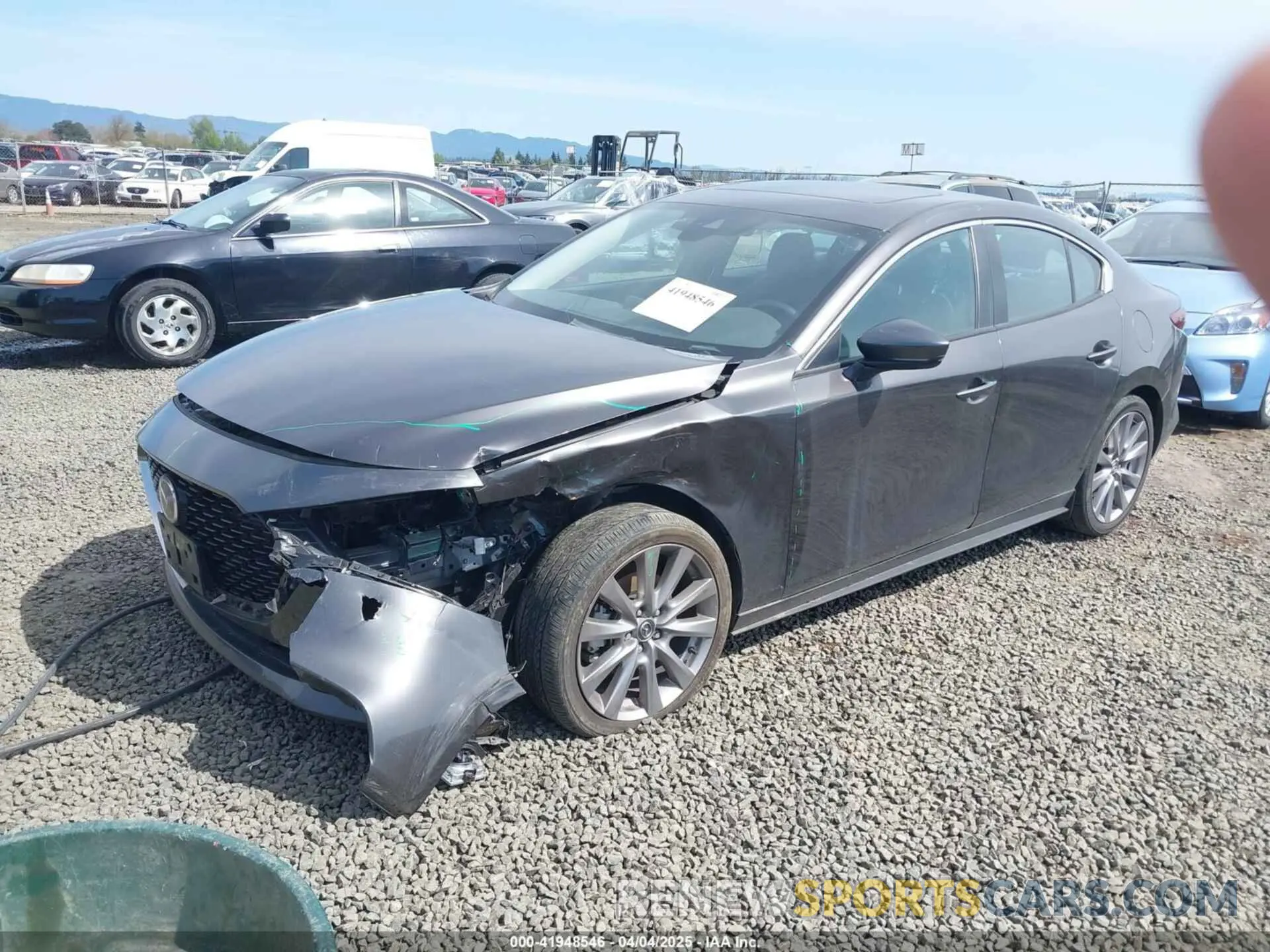 2 fotografías del automóvil dañado 3MZBPBCL7MM253158 MAZDA MAZDA3 2021