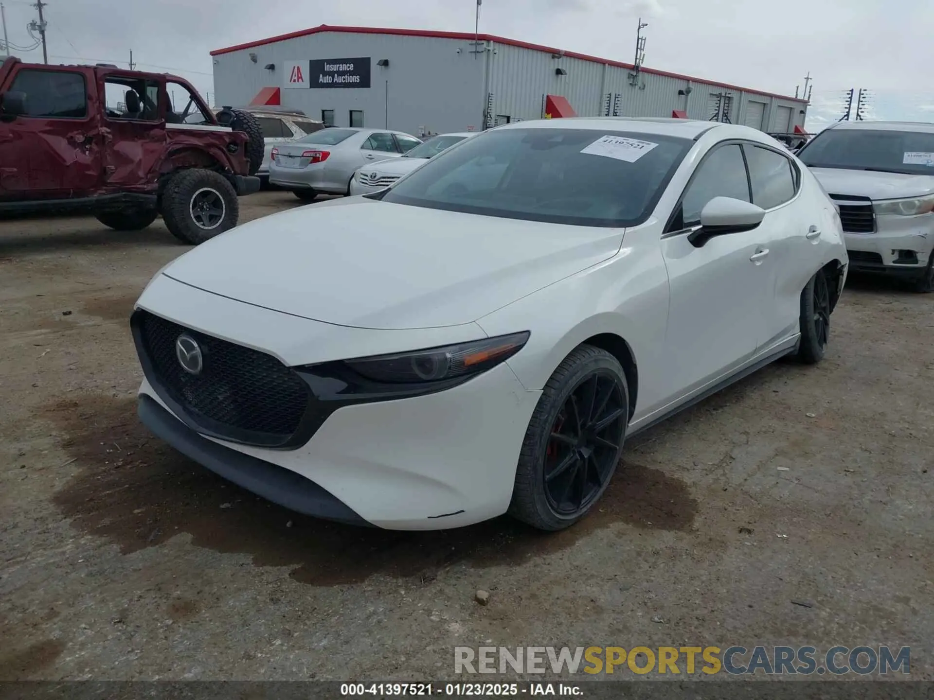 2 fotografías del automóvil dañado JM1BPAML0M1302385 MAZDA MAZDA3 2021