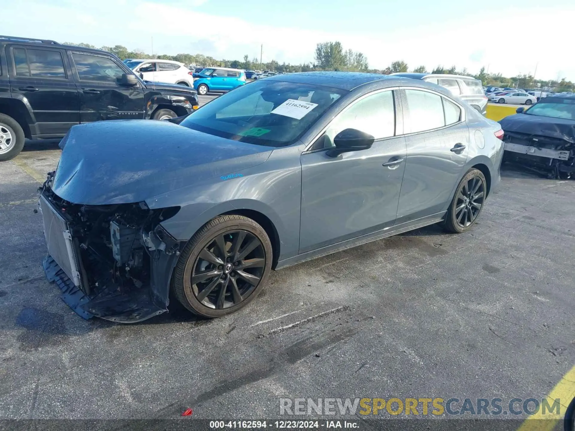 2 fotografías del automóvil dañado 3MZBPBCM5PM373232 MAZDA MAZDA3 2023