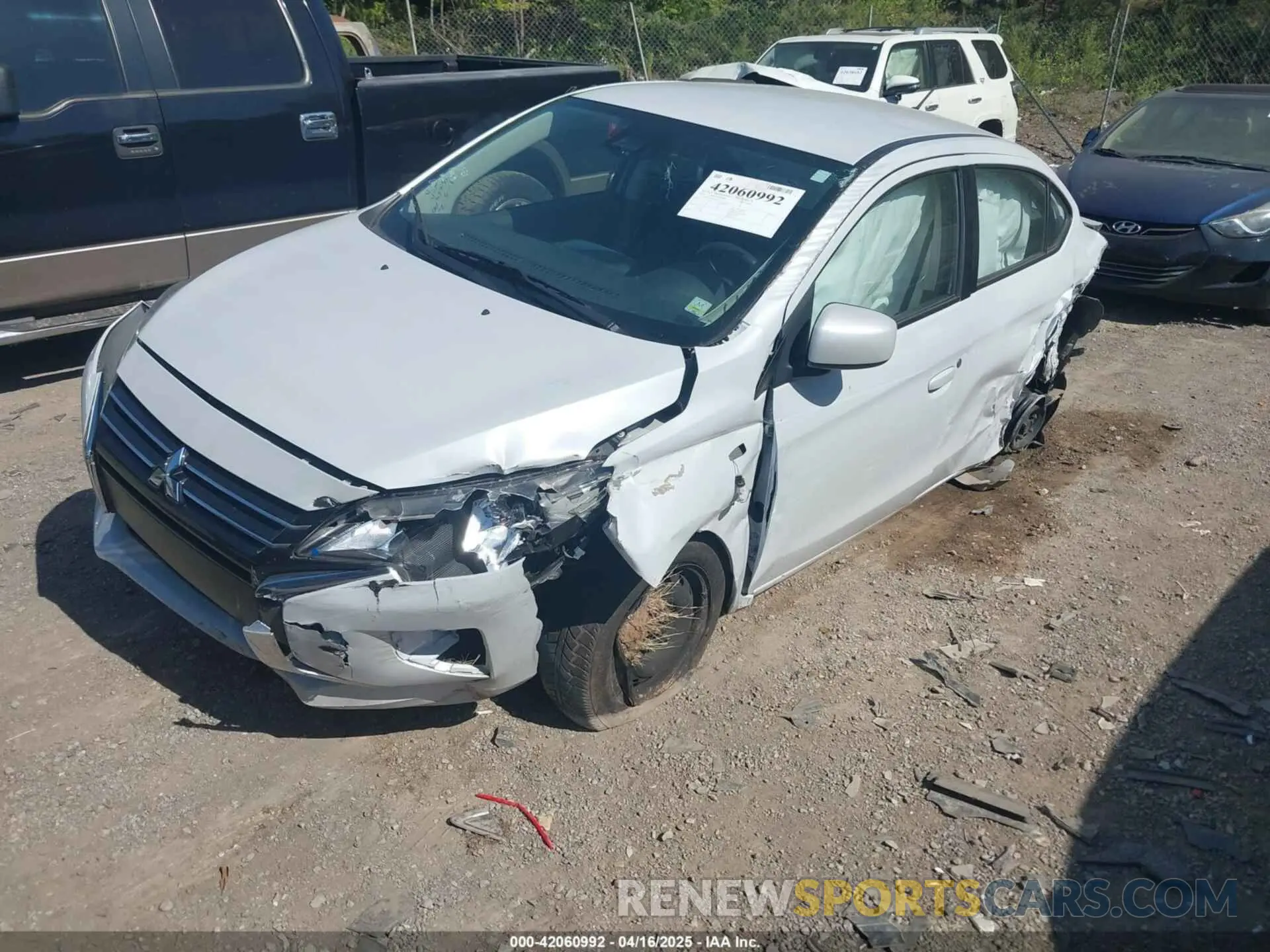 2 fotografías del automóvil dañado ML32FUFJ6NHF02539 MITSUBISHI MIRAGE G4 2022