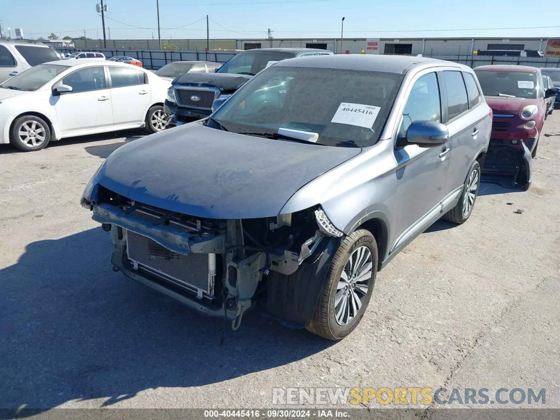 2 fotografías del automóvil dañado JA4AZ3A3XKZ023704 MITSUBISHI OUTLANDER 2019